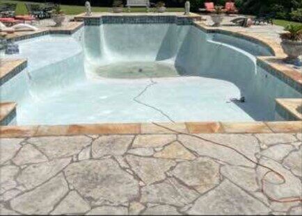 Gunite pool before recoating